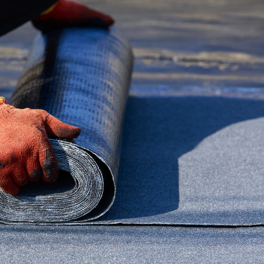 The Worker Puts Roofing Material In The Open Air CLEAR PROCESS & COMMUNICATION
